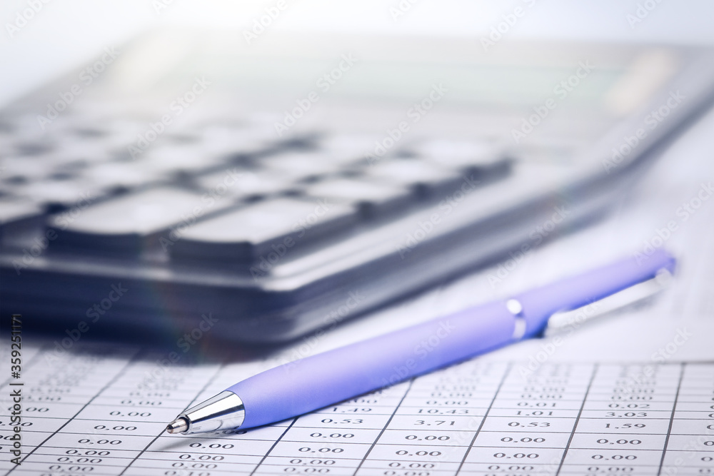 accounting document with pen and calculator. Concept of banking, financial report and financial audit. accounting document with pen and calculator. Concept of banking, financial report and financial audit.