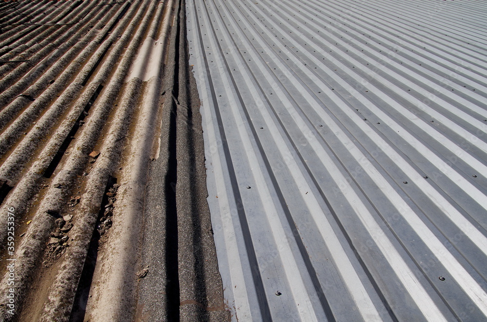old and new roof. covering roofing profile sheets and old corrugated cement sheet. old and new roof. covering roofing profile sheets and old corrugated cement sheet.