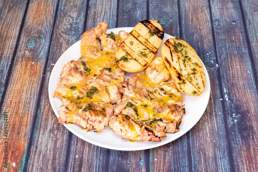 Grilled chicken meat with roasted potatoes Grilled chicken meat with roasted potatoes