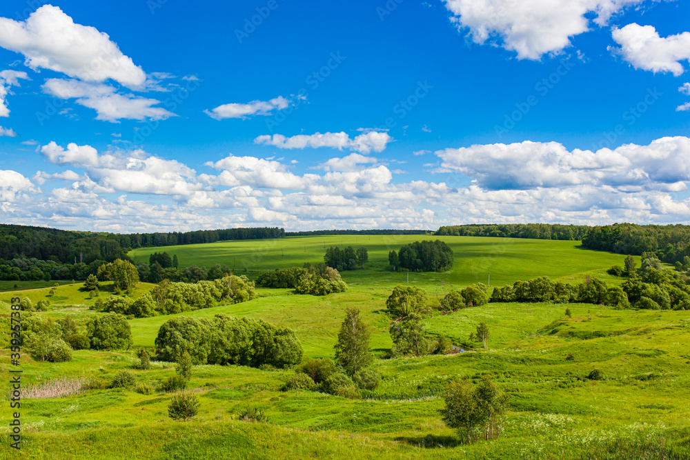Green hills and blue sky