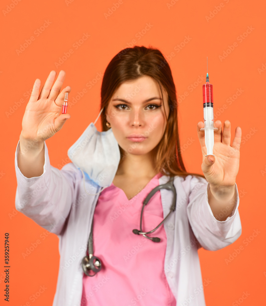 doctor use syringe, selective focus. nurse make injection. health worker dials vaccine in syringe. Physician or therapist giving vaccine against virus. coronavirus epidemic from china doctor use syringe, selective focus. nurse make injection. health worker dials vaccine in syringe. Physician or therapist giving vaccine against virus. coronavirus epidemic from china