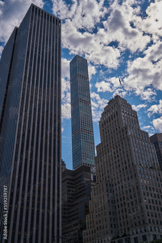 Casual New York City skyscrapers architecture and streets view in lights and glitters in the USA on hot summer day, Manhattan, Brooklyn, Times Square, subway, Brooklyn Bridge