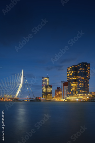 Rotterdam city skyline cityscape  Netherland  Holland  at night. View of downtown and Erasmus bridge