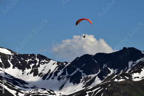 Paraglider over Alaska mountains