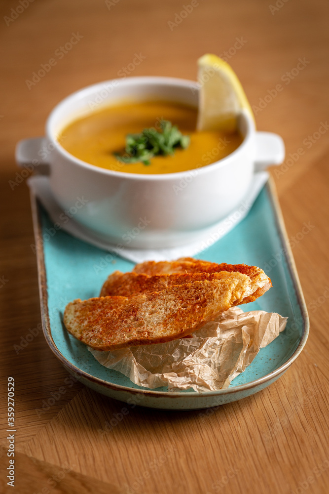 lentil soup, with crackers and lemon lentil soup, with crackers and lemon