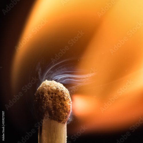 Flash of flame on a match. Close-up. Macro photography.