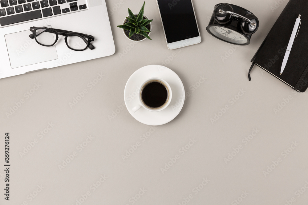 Flat lay of white espresso coffe cup with dish on light gray modern office desk with copy space Flat lay of white espresso coffe cup with dish on light gray modern office desk with copy space