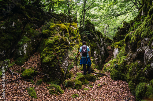 Mount Aizkorri 1523 meters, the highest in Guipuzcoa. Basque Country. Ascent through San Adrian and return through the Oltza fields. A young man in a beautiful spot in the forest of Mount Aizkorri