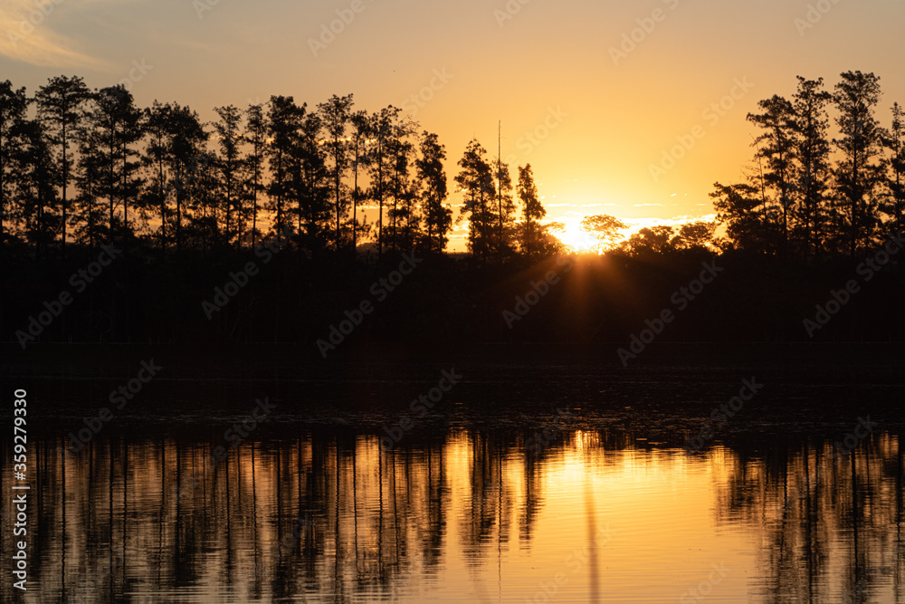Fototapeta premium sunset over lake