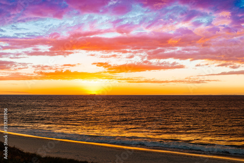sunset on the beach photo