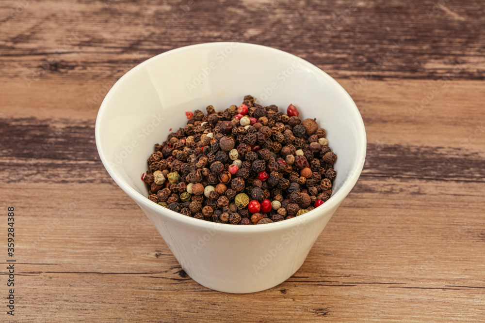 Peppercorn heap in the bowl Peppercorn heap in the bowl