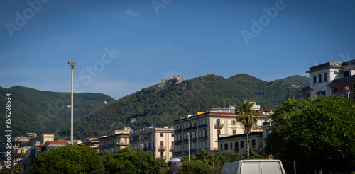 Vietri sul Mare cityscape and boats on coast line of mediterranean sea, Italy photo