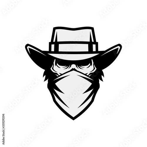 Human skull in mask and cowboy hat