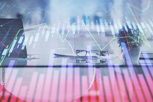 Double exposure of financial graph drawing and office interior background. Concept of stock market.