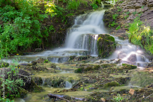 Small creek waterfall in the forest