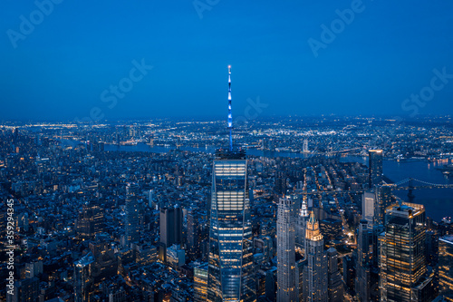 Aerial view of New York City skyline at sunset with both midtown, WTC, and downtown Manhattan © raoyang