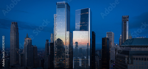 Aerial view of New York City skyline at sunset with both midtown, and downtown Manhattan