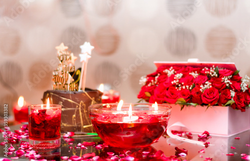 Fototapeta Naklejka Na Ścianę i Meble -  red roses and candles of decoration celebration.