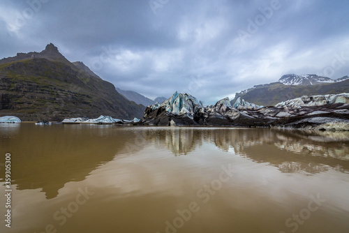 View on the tongue of Svinafell glacier in Iceland photo