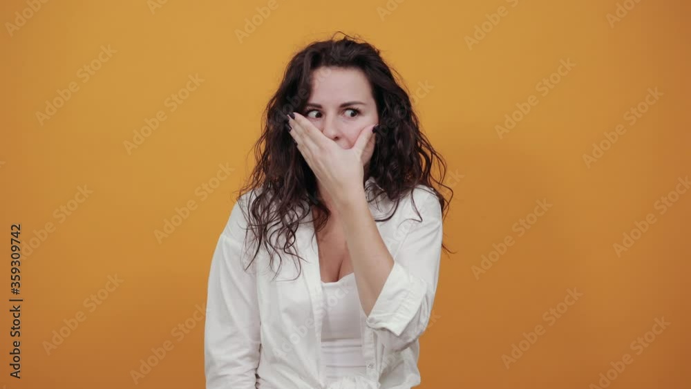 Covering her mouth with palm. Can't say anything. Shocked gasping amazed hearing stunning unbelievable news press palm mouth astonished gossiping found out shocking truth, stunned speechless