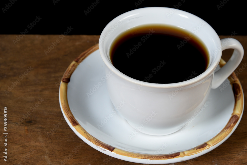 cup with roasted coffee beans inside, on the table with roasted beans top view,. cup with roasted coffee beans inside, on the table with roasted beans top view,.