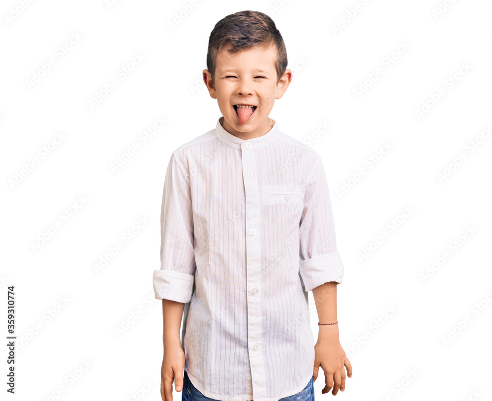Cute blond kid wearing elegant shirt sticking tongue out happy with funny expression. emotion concept. Cute blond kid wearing elegant shirt sticking tongue out happy with funny expression. emotion concept.