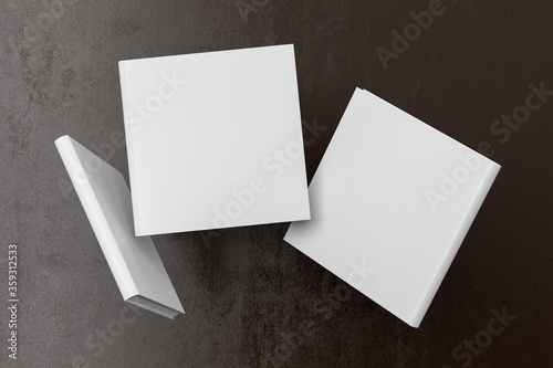 Quadro su tela Square blank book cover mock up flying over brown background