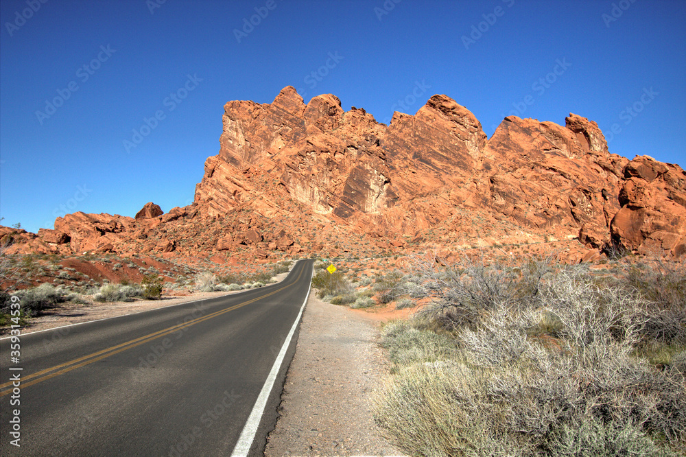 Nevada Highway 169 is a Nevada state scenic byway. The two lane highway goes through the Valley of Fire offering scenic mountain and desert views. 