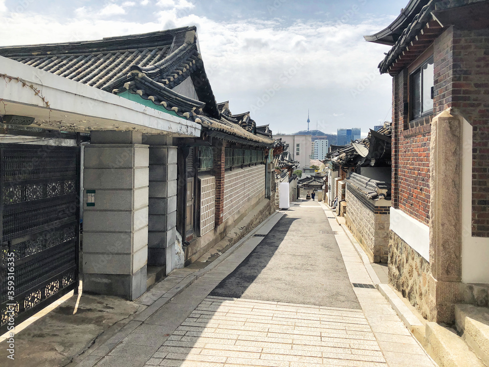 Bukchon Hanok Village And Seoul tower in daylight at Seoul, South Korea.