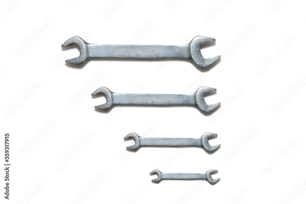 Fixed wrenches lined up on white background Fixed wrenches lined up on white background