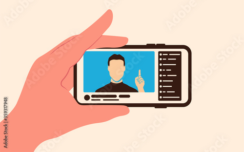 Live video stream with broadcaster and chat on screen phone.