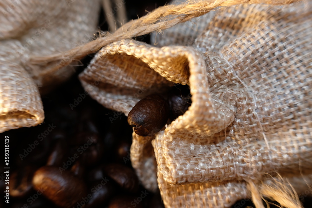 close up coffee beans and macro coffee beans on wood table background close up coffee beans and macro coffee beans on wood table background