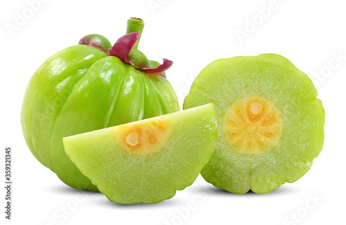 Garcinia atroviridis fruit isolated on white background photo