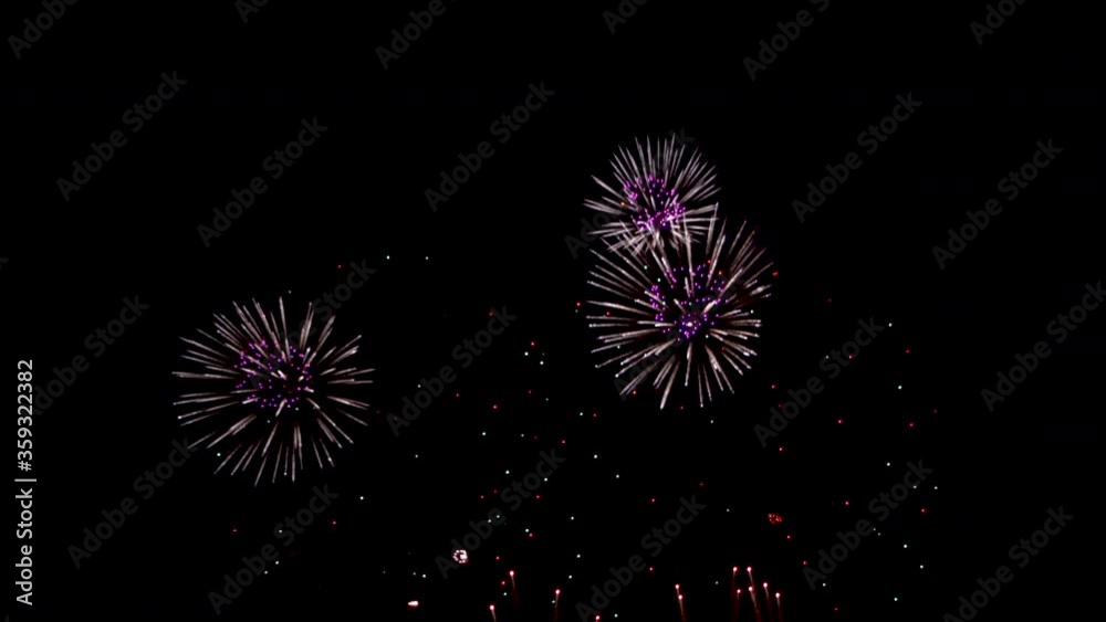 Many flashing colourful fireworks in event amazing with black background celebrate New Year, holiday and festival in night. Many flashing colourful fireworks in event amazing with black background celebrate New Year, holiday and festival in night.