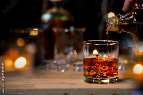 Bartender Serve Whiskey, on wood bar