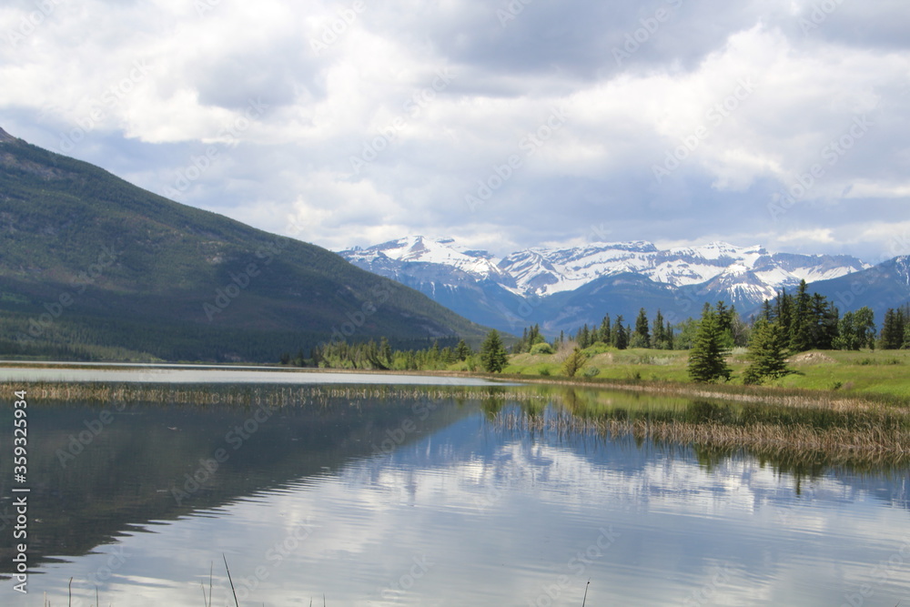 Spring Reflections On Talbot Lake, Jasper National Park, Alberta Spring Reflections On Talbot Lake, Jasper National Park, Alberta