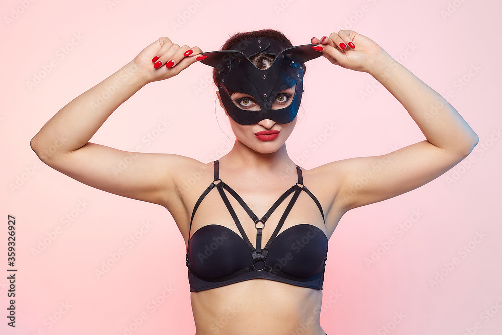 custom made wallpaper toronto digitalbeautiful girl in a cat mask. playfully posing in front of the camera