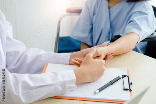 The doctor held the patient's hand with love