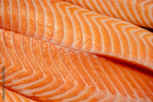 Closeup fresh raw Atlantic salmon fillets.