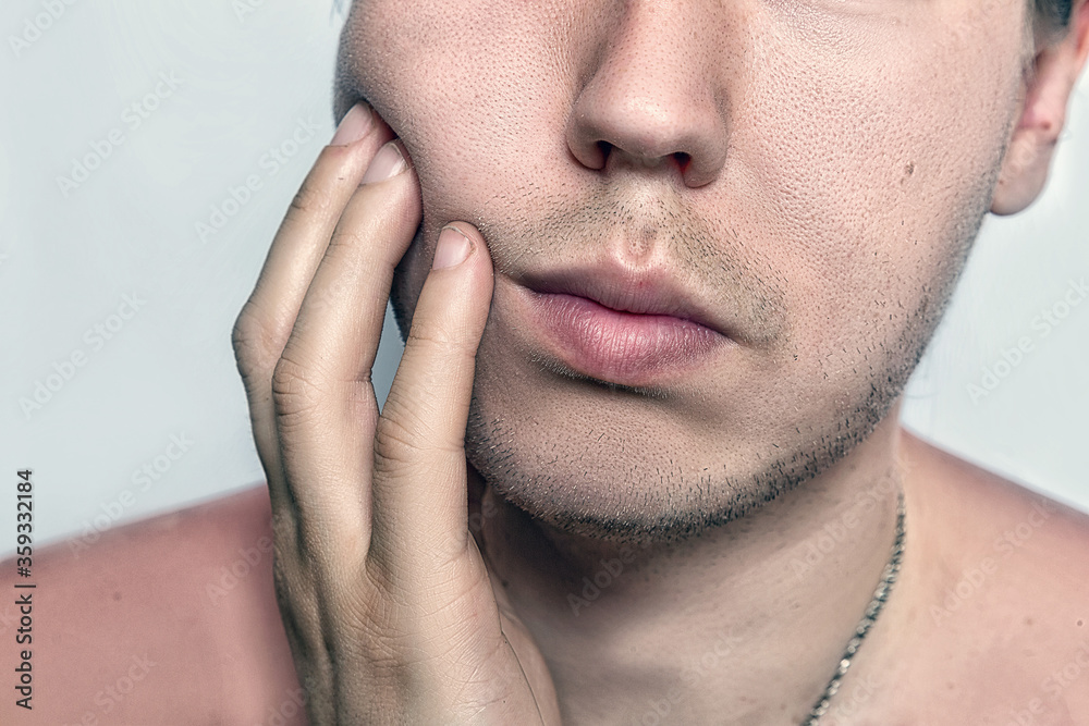 Fototapeta premium Shot of handsome attractive young caucasian male after shaving