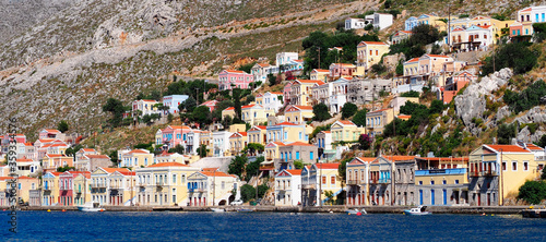 Symi town, Symi island, pictorial view of colorful houses and  Yialos harbour © VP