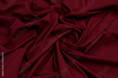 Fabric cotton fold, top view. Red textile
