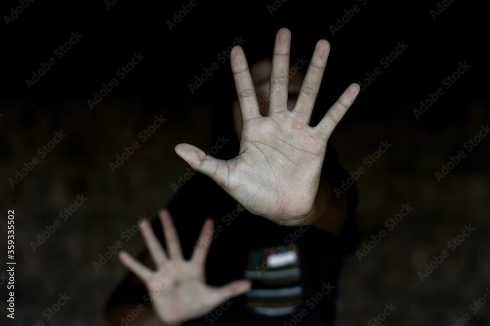 Child showing hand for Stop violence and abused children concept. Child showing hand for Stop violence and abused children concept.