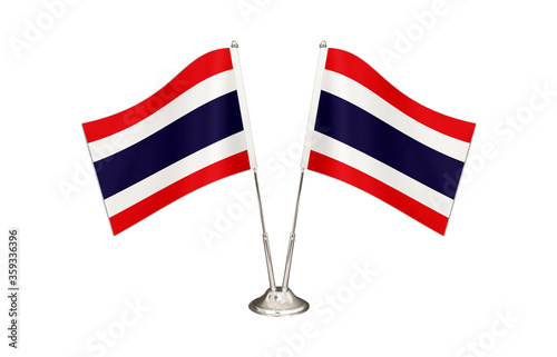 Thailand table flag isolated on white ground. Two flag poles with flags and Thailand flag on the table.