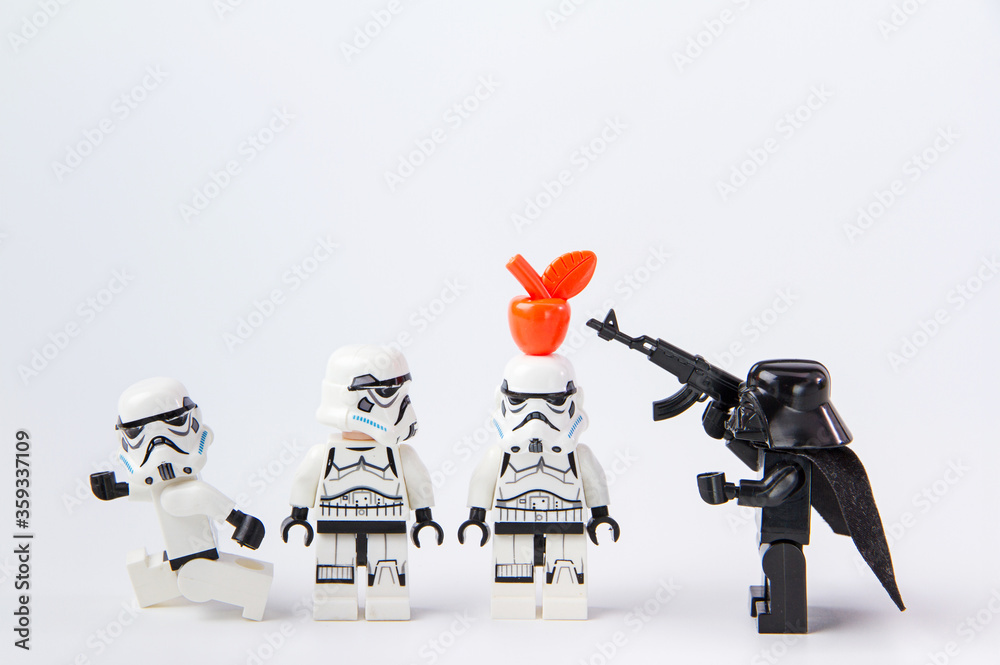 Nonthabure, Thailand - June, 28, 2016: Lego star wars test precision  putting an apple on head.The lego Star Wars mini figures from movie series.  Stock Photo | Adobe Stock