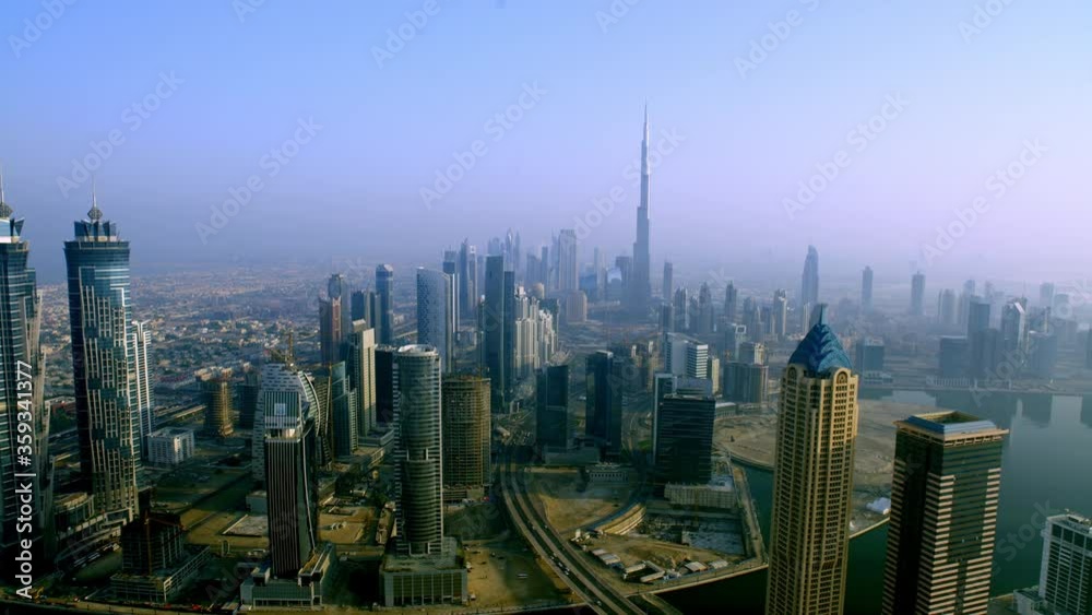 Dubai skyline with beautiful city close to it's busiest highway on traffic and Burj Khalifa canal and Downtown revealing dubai downtwon. helicopter, 6-axis stabilized gimbal, shootover F1, 8K, Dubai skyline with beautiful city close to it's busiest highway on traffic and Burj Khalifa canal and Downtown revealing dubai downtwon. helicopter, 6-axis stabilized gimbal, shootover F1, 8K,