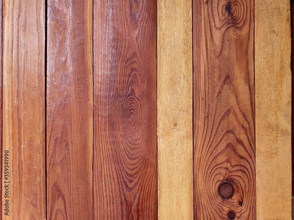 Beautiful wooden patterns with light from the side. Brown texture on the vintage wooden background
Beautiful wooden patterns with light from the side. Brown texture on the vintage wooden background