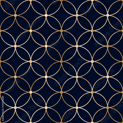 Seamless abstract geometric pattern with gold lines and segments circles on blue background