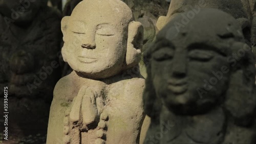 Otagi Nenbutsu-ji Japanese Buddhist Temple in Arashiyama, Kyoto, Japan - 1200 Rakan Stone statues Representing The Disciples of Buddha photo