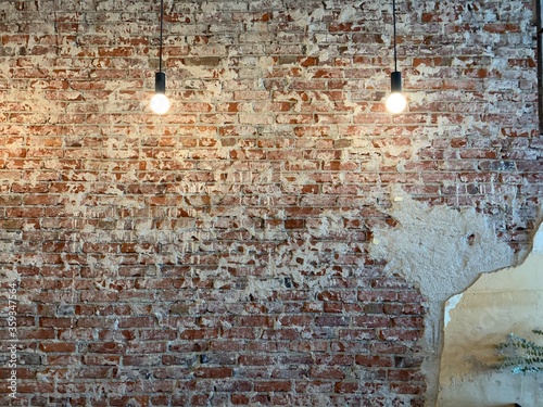 A Brick Wall and Two Lights